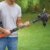 Black+Decker 18 V, 2.0 Ah Rasentrimmer AFS Reflex Fadenverlängerung, Akku und Ladegerät, 28 cm Schnittbreite, STC1820PC - 
