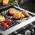 RÖSLE Gasgrill BBQ-Portable VIDERO G2-P, tragbarer Tischgrill mit 2 Edelstahlbrennern, Warmhalterost und Deckel mit Glaseinsatz sowie Deckelthermometer, pulverbeschichteter Stahl, 50 mbar - 8