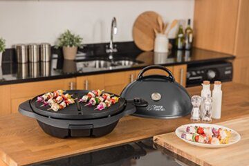 George Foreman Grill 2in1 Elektrogrill [Testsieger]: Standgrill & Tischgrill (Innen- & Außennutzung, Balkon & Küche, Ø44,5cm, Temperaturanzeige, Fettauffangschale, 2400W) Kugelgrill 22460-56, Schwarz - 13