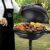 George Foreman Grill 2in1 Elektrogrill [Testsieger]: Standgrill & Tischgrill (Innen- & Außennutzung, Balkon & Küche, Ø44,5cm, Temperaturanzeige, Fettauffangschale, 2400W) Kugelgrill 22460-56, Schwarz - 7