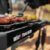 Weber Traveler Compact Gasgrill, 1 Brenner, 52 x 36cm Grillfläche, portabler Outdoor BBQ, mit Deckelthermometer, Stand mit Rädern einklappbar - Schwarz (1500526) - 9